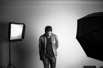 Grayscale Photography of Standing Man in Studio Grayscale Photography of Standing Man in Studio