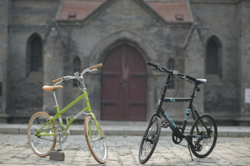 Green Bike Beside Black Bike Green Bike Beside Black Bike