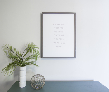 Green Leafed Plant Near Photo Frame Green Leafed Plant Near Photo Frame