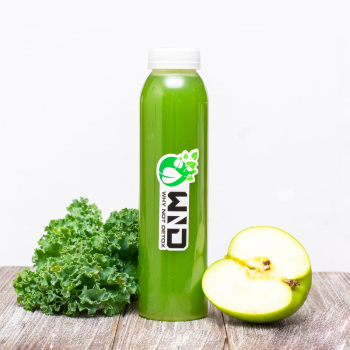 Green Plastic Bottle Beside Green Apple Green Plastic Bottle Beside Green Apple