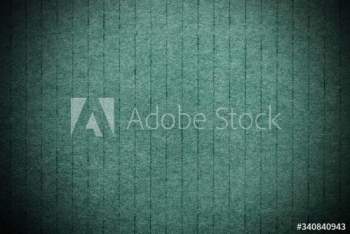 Green textured paper background Green textured paper background