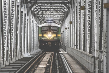 green train on railroad green train on railroad