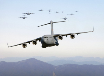 Grey Cargo Plane Flying Grey Cargo Plane Flying