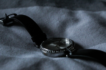 Grey Watch on Grey Textile Grey Watch on Grey Textile