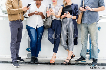 Group of diverse people using smartphones Group of diverse people using smartphones