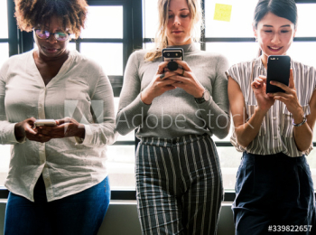 Group of diverse people using smartphones Group of diverse people using smartphones