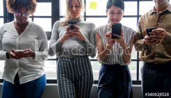 Group of diverse people using smartphones Group of diverse people using smartphones