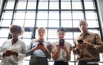 Group of diverse people using smartphones Group of diverse people using smartphones