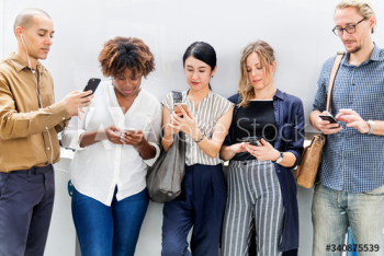 Group of diverse people using smartphones Group of diverse people using smartphones