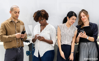 Group of diverse people using smartphones Group of diverse people using smartphones