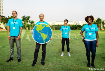 Group of happy and diverse volunteers Group of happy and diverse volunteers