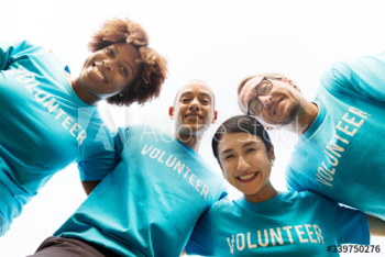 Group of happy and diverse volunteers Group of happy and diverse volunteers