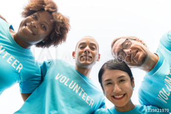 Group of happy and diverse volunteers Group of happy and diverse volunteers