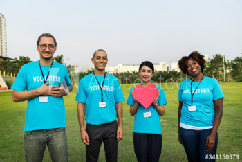 Group of happy and diverse volunteers Group of happy and diverse volunteers