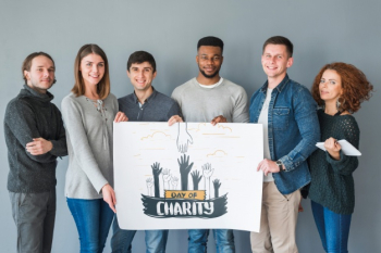 Group of people holding placard mockup for charity Free Psd
