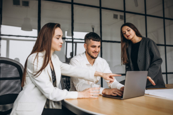 Group of people working out business plan in an office Free Photo Group of people working out business plan in an office Free Photo