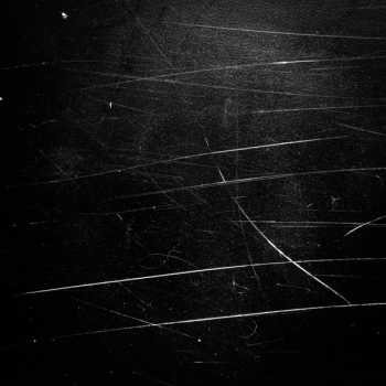 Grunge background. Black scratched texture