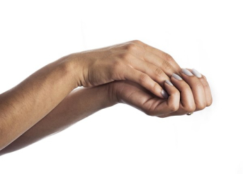 Hand Holding Another Hand Holding Another