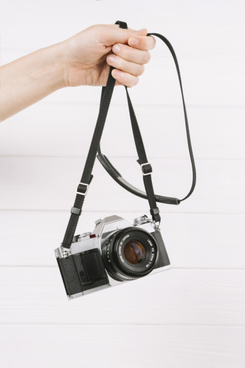 Hand holding camera Hand holding camera