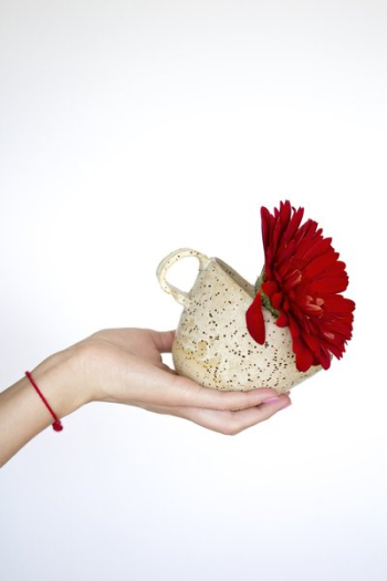 Hand Holding Cup Wth Flower Hand Holding Cup Wth Flower