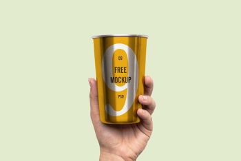 Hand Holding Metal Cup Hand Holding Metal Cup