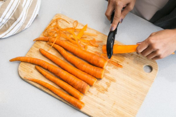 Hand Peeling Carrots Hand Peeling Carrots