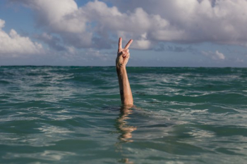 Hands Peace Sign In Water Hands Peace Sign In Water