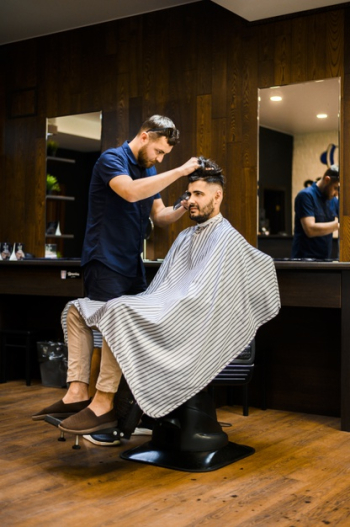 Handsome man getting a new haircut Free Photo Handsome man getting a new haircut Free Photo
