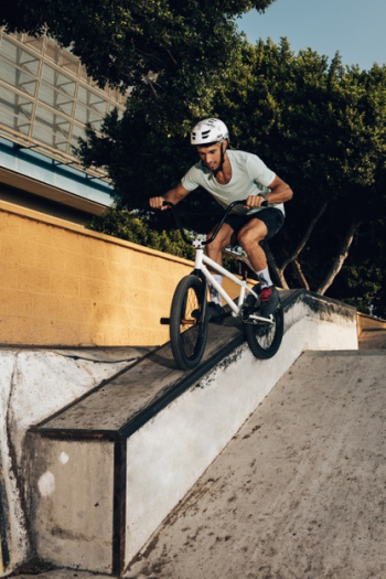 Handsome man training in skatepark Free Photo