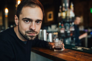 Handsome young man in a pub Handsome young man in a pub