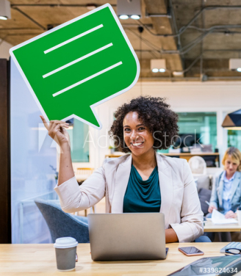 Happy businesswoman with speech bubble Happy businesswoman with speech bubble