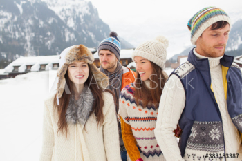 Happy couples friends walking in snow Happy couples friends walking in snow