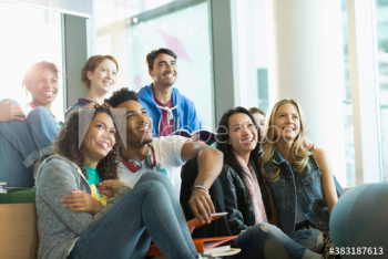 Happy diverse young college students in student lounge Happy diverse young college students in student lounge