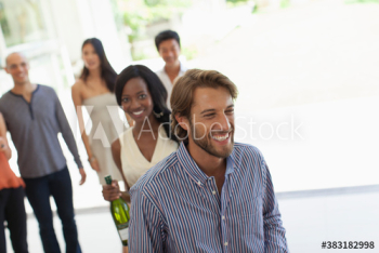 Happy friends enjoying social gathering