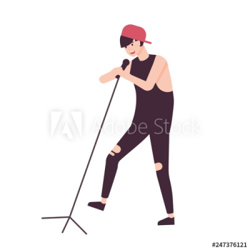 Happy man singer, rock vocalist or punk rocker wearing cap and singing in microphone