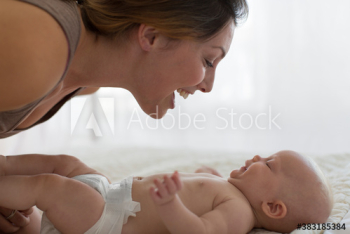 Happy mother and baby son