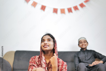Happy Muslim family celebrating Eid Mubarak Happy Muslim family celebrating Eid Mubarak