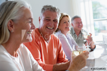 Happy senior couples drinking white wine Happy senior couples drinking white wine