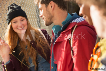 Happy young friends talking Happy young friends talking
