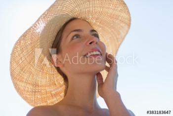Happy young woman in sun hat Happy young woman in sun hat