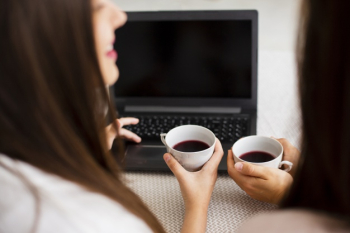 High angle women at home using laptop Free Photo