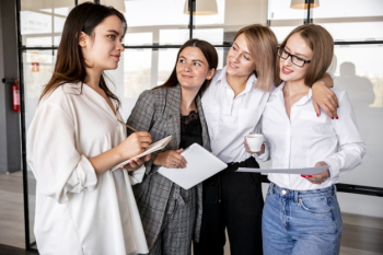 High angle women at office planing Free Photo