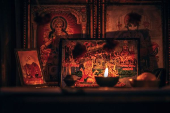 Hindu God altar with candle light Hindu God altar with candle light