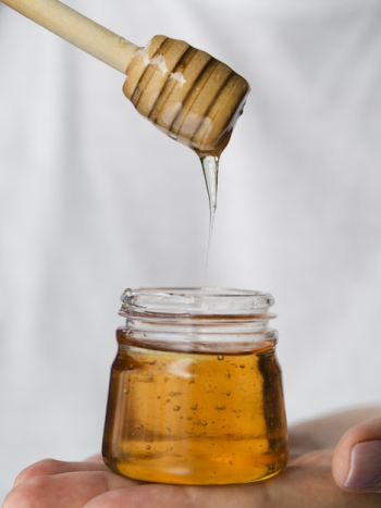 Honey dripping from dipper Free Photo Honey dripping from dipper Free Photo