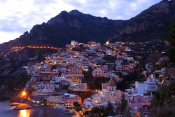 houses beside sea with mountain background houses beside sea with mountain background