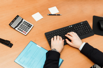 Human Hand on Computer Keyboard Human Hand on Computer Keyboard