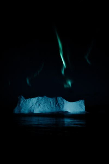 ice berg and aurora borealis ice berg and aurora borealis