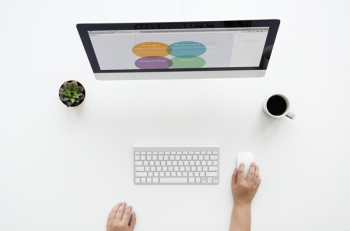Imac On White Surface Near Apple Keyboard And Magic Mouse 