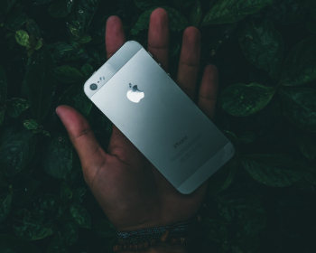 Iphone 5 on Person's Palm Iphone 5 on Person's Palm