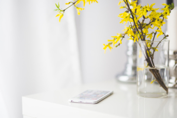 iPhone 6 plus on a white desk iPhone 6 plus on a white desk
